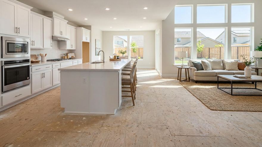 Roseville new build before: bare plywood subfloor